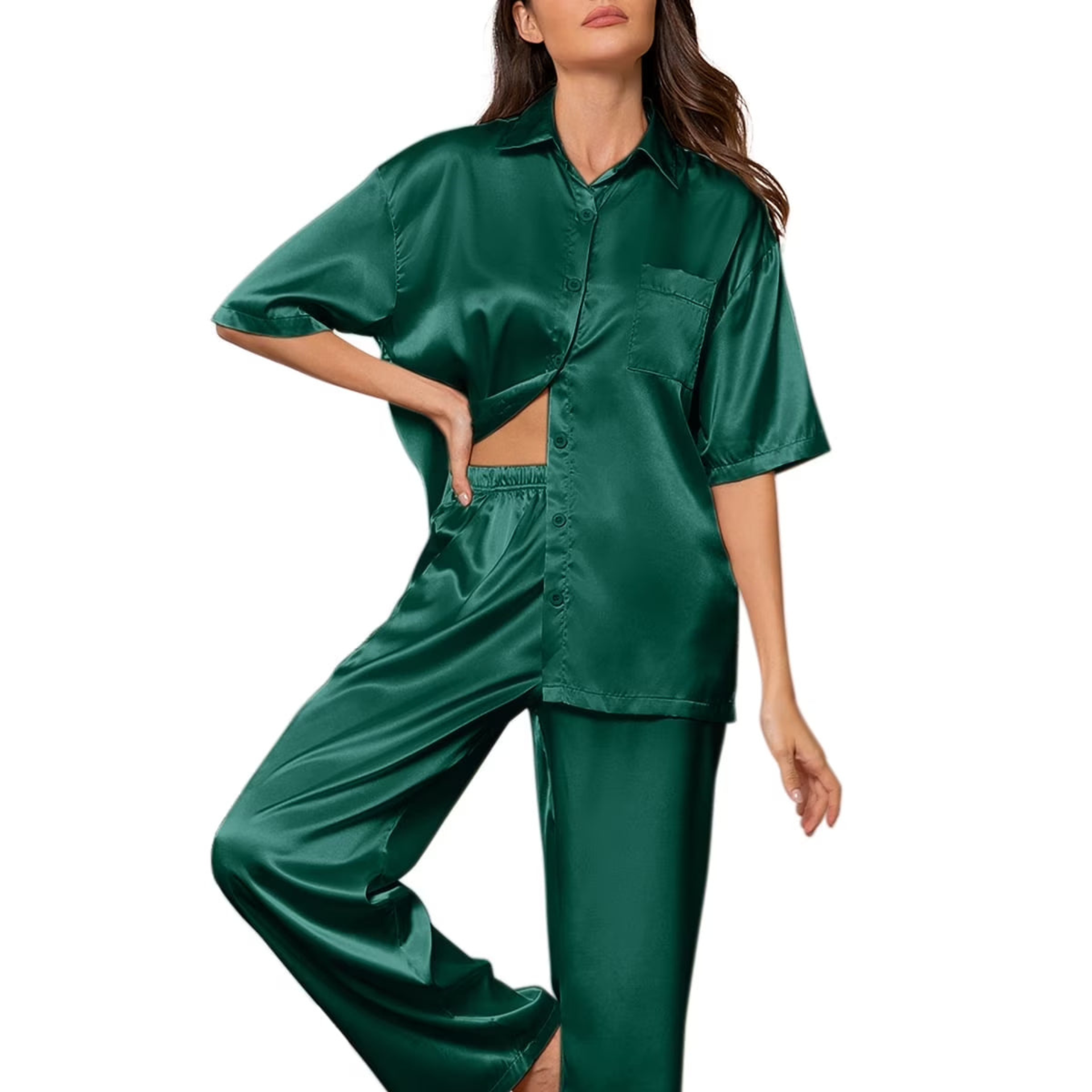 Woman wearing a green satin shirt and pants set on a white background