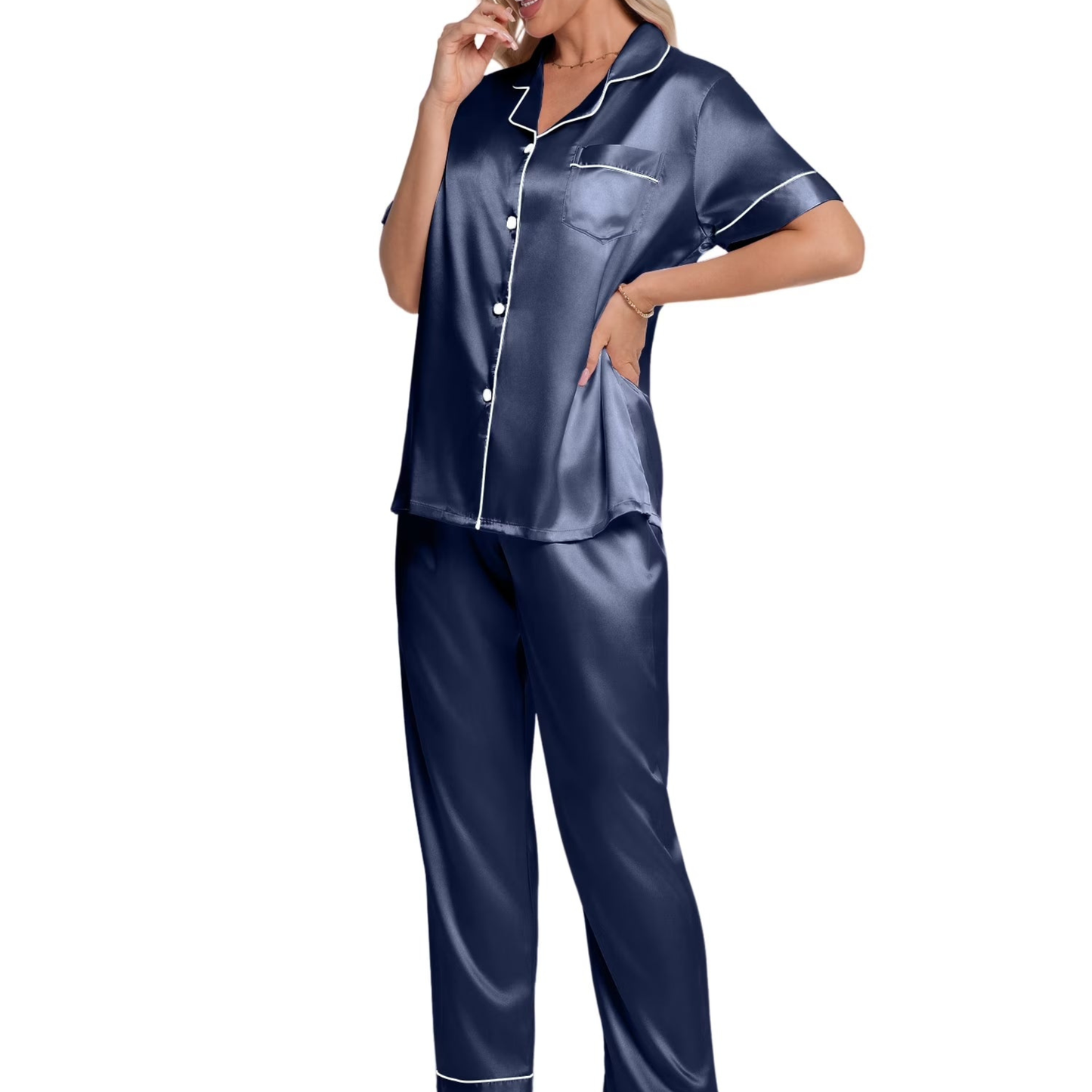 Navy satin pajama set with white piping worn by a model on a white background