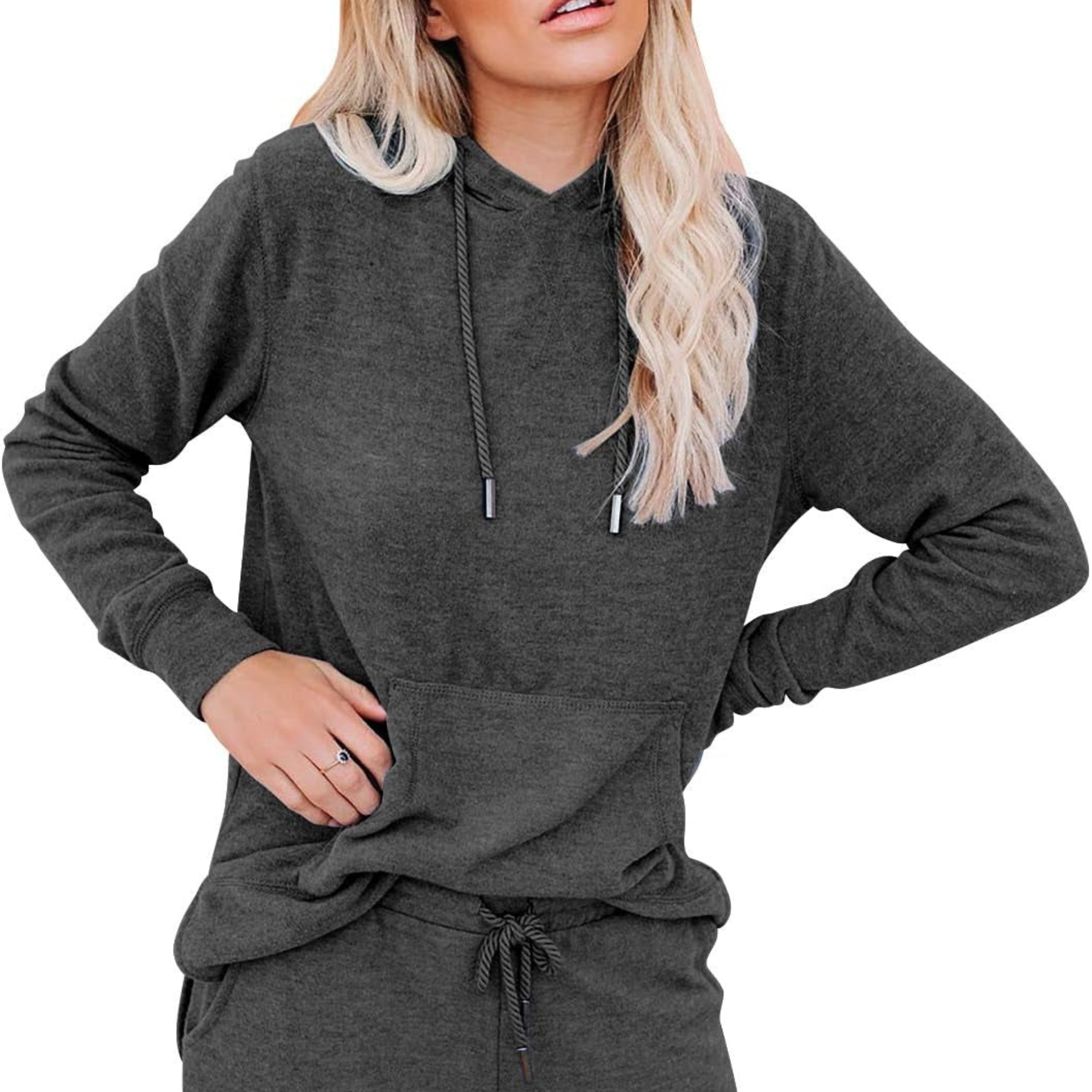 Person wearing a dark gray hoodie and pants on a white background