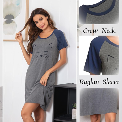 Woman wearing a gray and navy cat-themed nightshirt with close-up details on a white background.