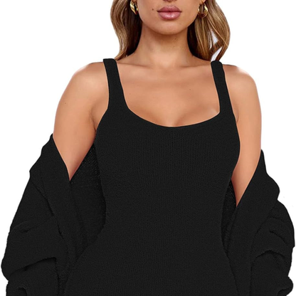 Person wearing a black sleeveless top with a blurred background