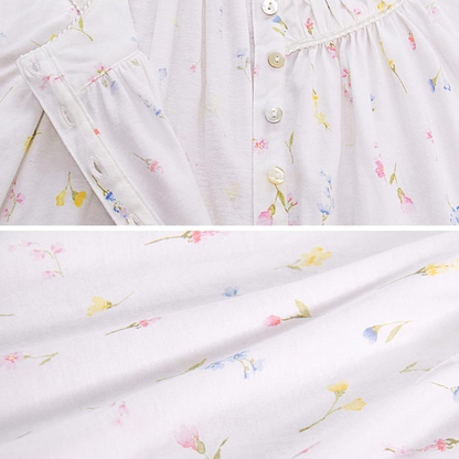Close-up of a white fabric with floral pattern, showing texture and design details.